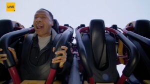 Terrell rides the Wrath of Rakshasa roller coaster at Six